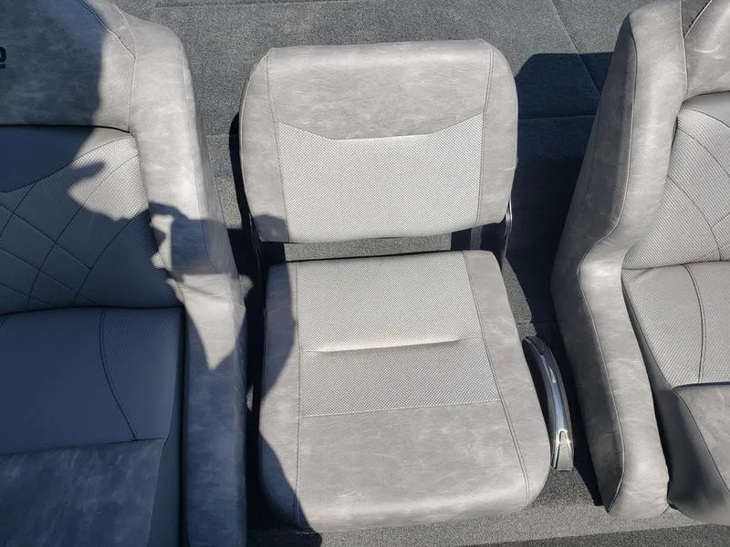 Slide: The Image of 2023 Avid 18XB boat seats, gray upholstery, modern design. - 15