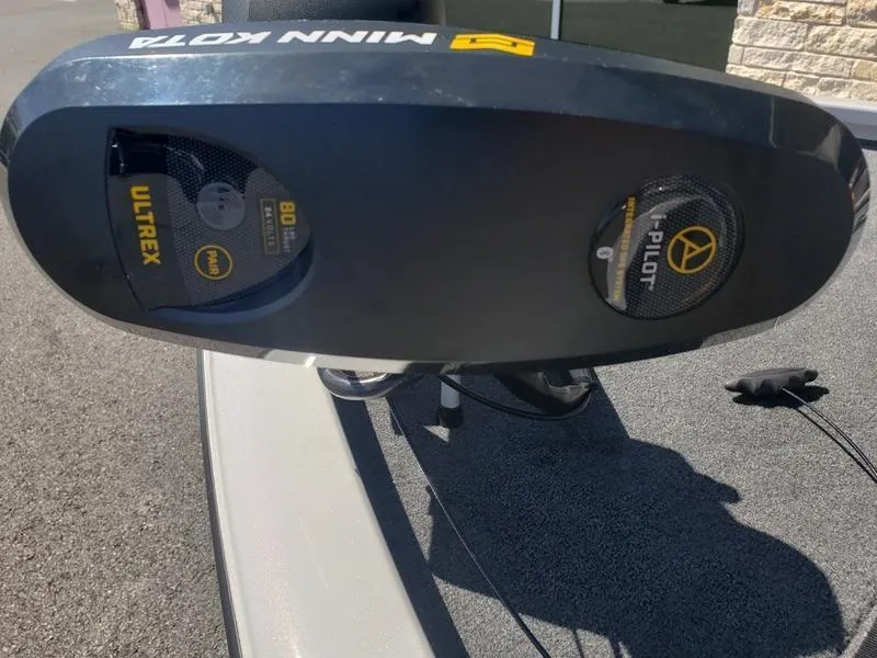 Slide: The Image of Minn Kota Ultrex trolling motor on 2023 Avid 18XB boat deck. - 19