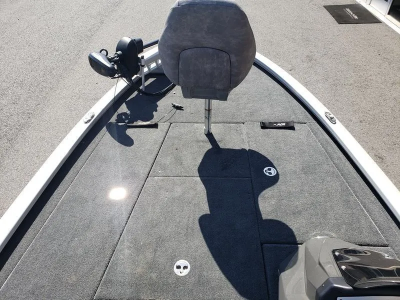 Slide: The Image of 2023 Avid 18XB boat deck with gray seating and carpeted surface. - 20