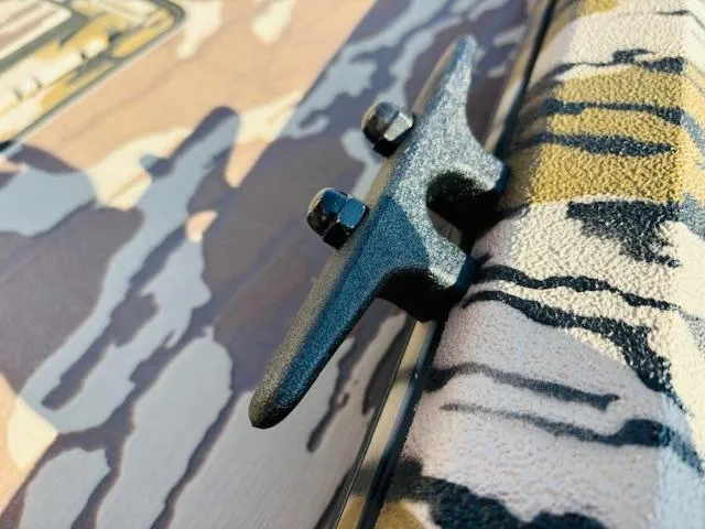 Slide: The Image of Close-up of Avid 16COM 2025 boat cleat with camouflage pattern. - 11