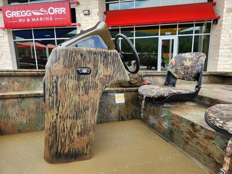 Slide: The Image of 2024 G3 17 SC boat with camouflage design at Gregg Orr RV & Marine dealership. - 11