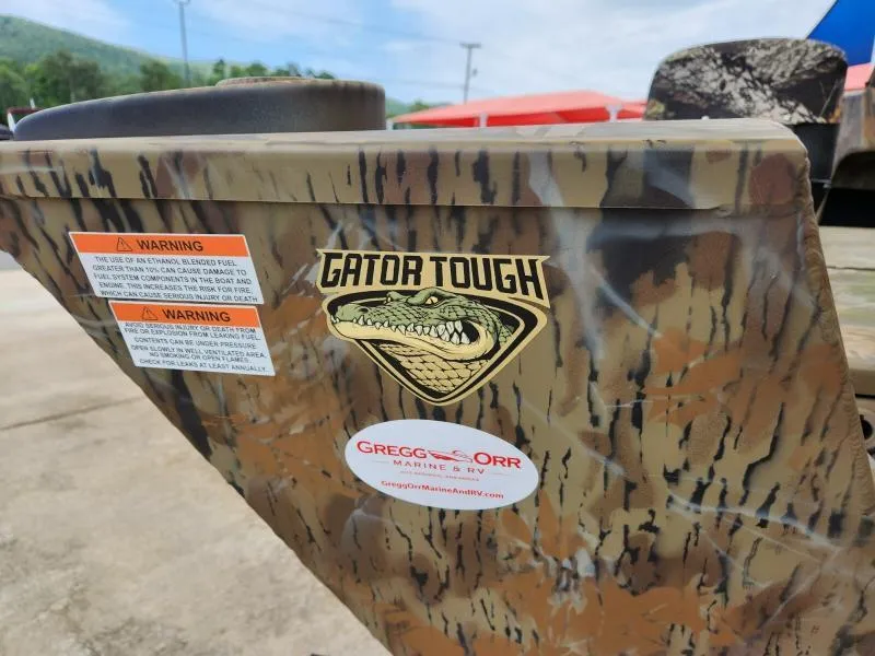 Slide: The Image of 2024 G3 17 SC boat with camouflage design and "Gator Tough" logo. - 19