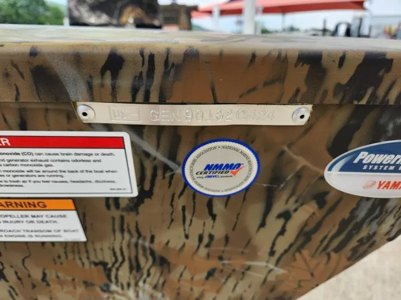 Slide: The Image of 2024 G3 17 SC boat with camouflage pattern, NMMA certification, and safety warnings. - 21