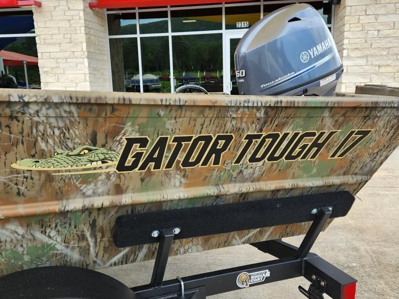 Slide: The Image of 2024 G3 17 SC boat with camo design and Yamaha motor, labeled "Gator Tough 17". - 9