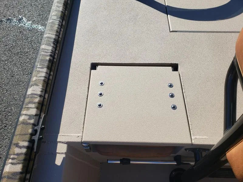 Slide: The Image of 2024 Avid Rogue 20 CC boat deck with storage compartment and seating. - 10