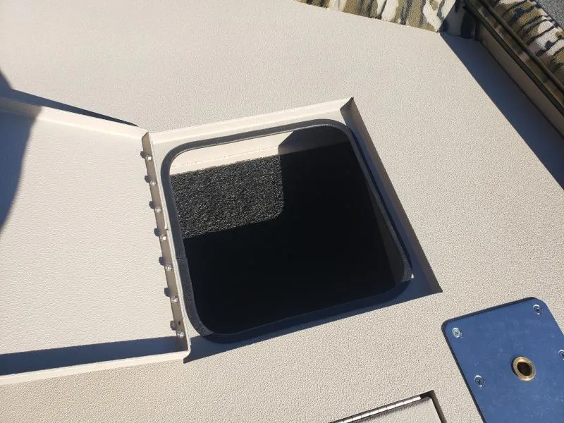 Slide: The Image of Open hatch on 2024 Avid Rogue 20 CC boat deck. - 19