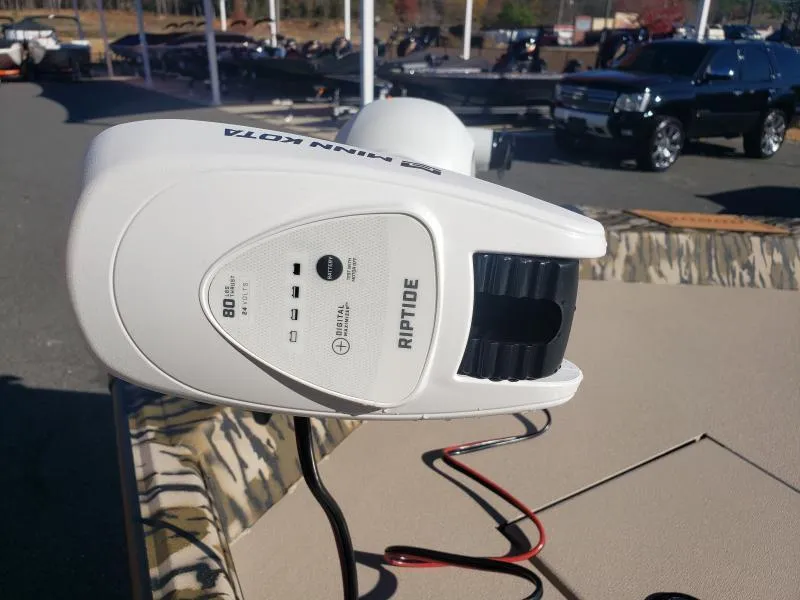 Slide: The Image of Minn Kota Riptide motor on 2024 Avid Rogue 20 CC boat, outdoor display. - 21