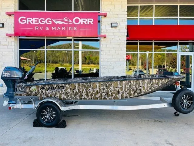 Slide: The Image of 2025 Avid 16 Commander boat with camouflage design at Gregg Orr RV & Marine. - 2