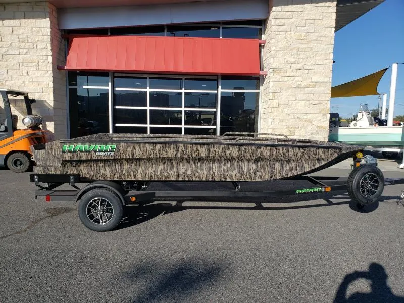 Slide: The Image of 2024 Havoc Boats 1756 Dbst on trailer, parked outside dealership. - 10