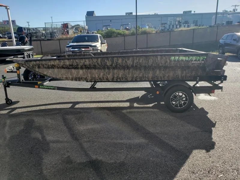 Slide: The Image of 2024 Havoc Boats 1756 Dbst on trailer, parked outdoors in a lot. - 15