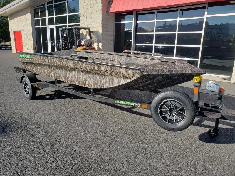 Slide: The Image of 2024 Havoc Boats 1756 Dbst on trailer, parked outside a building. - 18