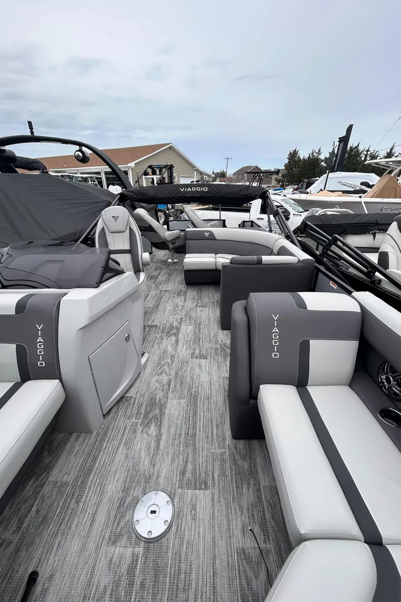 Slide: The Image of 2025 Viaggio Lago X-R boat interior with sleek seating and modern design. - 6