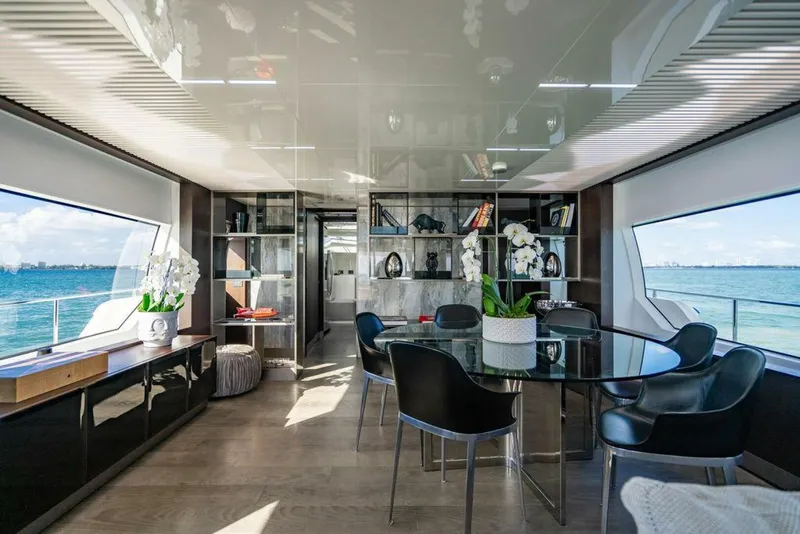 Slide: The Image of Luxurious interior of 2018 Ferretti Yachts 850 Motor Yacht with elegant dining area. - 15