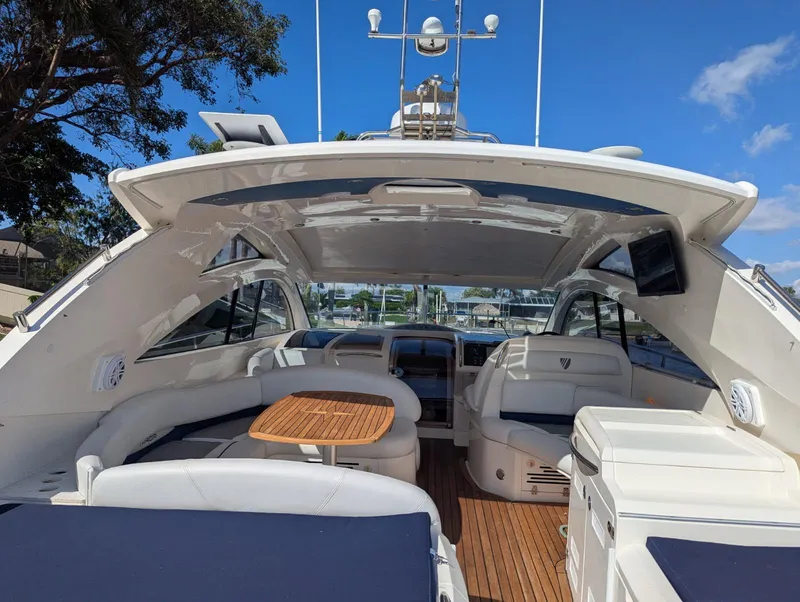 Slide: The Image of 2007 Fairline Targa 52 GT yacht interior with seating, table, and navigation equipment. - 3