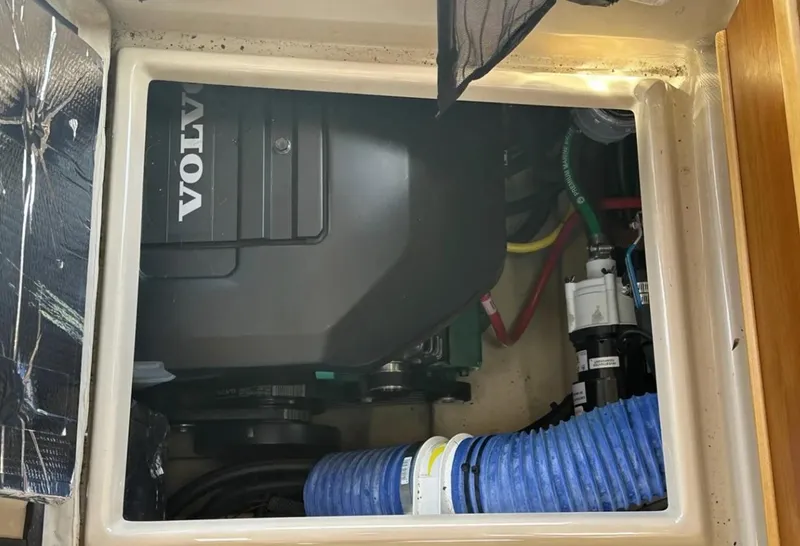 Slide: The Image of Engine compartment of a 2016 Cutwater C-26 boat with Volvo components. - 14