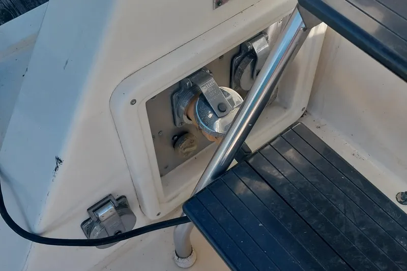 Slide: The Image of 1988 Hatteras 40 Double Cabin boat detail with steps and winch mechanism. - 11