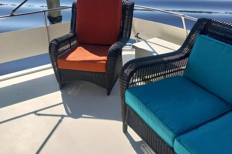 Slide: The Image of Outdoor seating on 1988 Hatteras 40 Double Cabin yacht deck. - 13