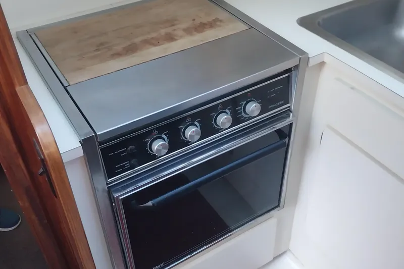 Slide: The Image of Stove and oven in 1988 Hatteras 40 Double Cabin yacht kitchen. - 16