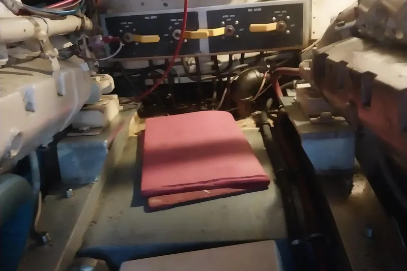 Slide: The Image of Engine room of 1988 Hatteras 40 Double Cabin with control panel and wiring. - 30