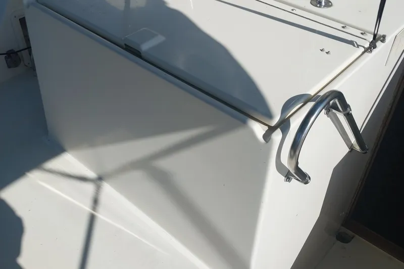 Slide: The Image of 1988 Hatteras 40 Double Cabin boat deck with metal railing. - 7
