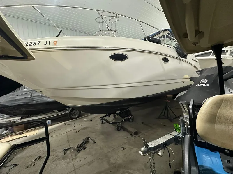 Slide: The Image of 2003 Chaparral Signature 280 boat in indoor storage, side view. - 10