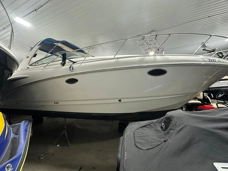 Slide: The Image of 2003 Chaparral Signature 280 boat in indoor storage, side view. - 12