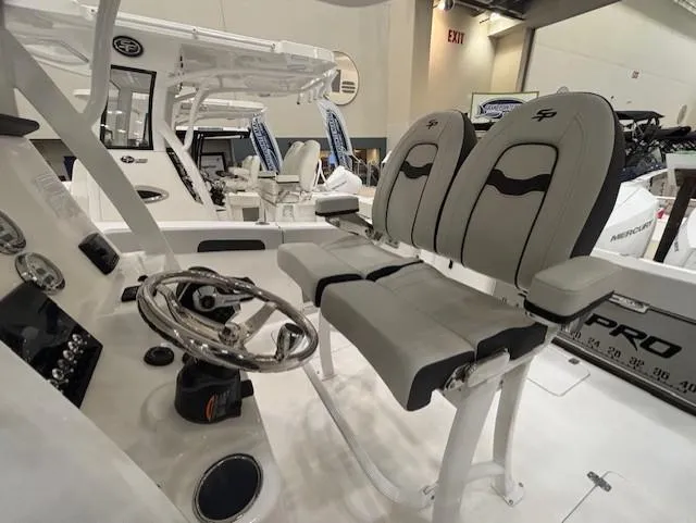 Slide: The Image of 2025 Sea Pro 262 Offshore boat with dual Mercury outboard engines and livewell. - 15
