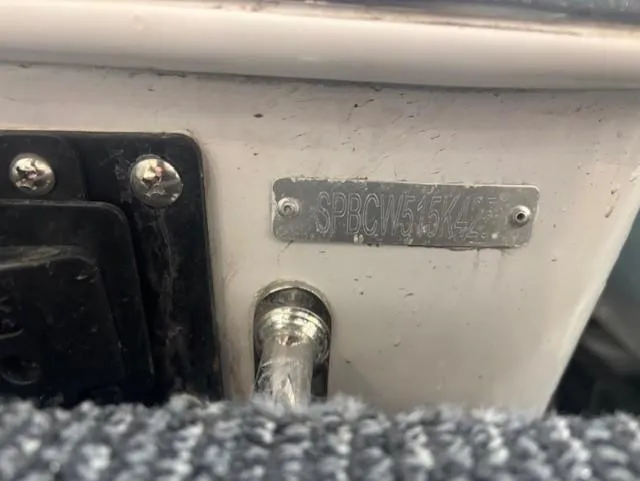 Slide: The Image of 2025 Sea Pro 262 Offshore boat interior at a boat show, showcasing seating and helm. - 36