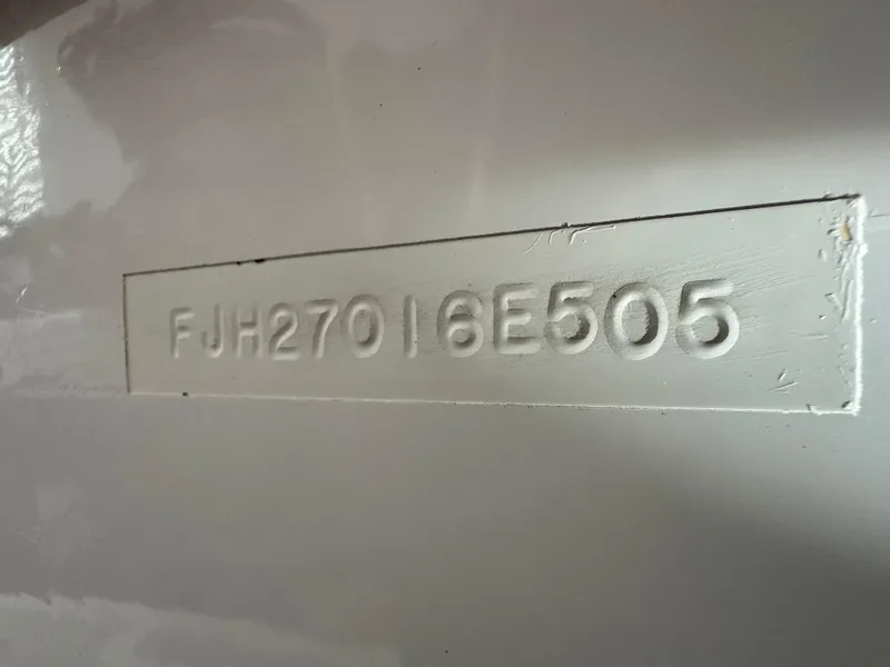 Slide: The Image of Hull identification number on a 2005 Farallon 28 boat. - 13