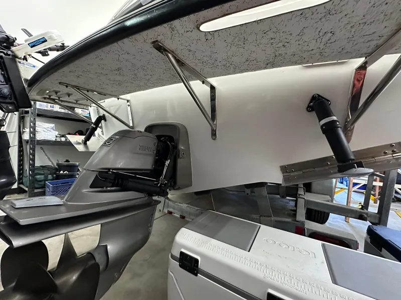 Slide: The Image of Farallon 28 boat, 2005 model, with outboard motor and storage compartments. - 14