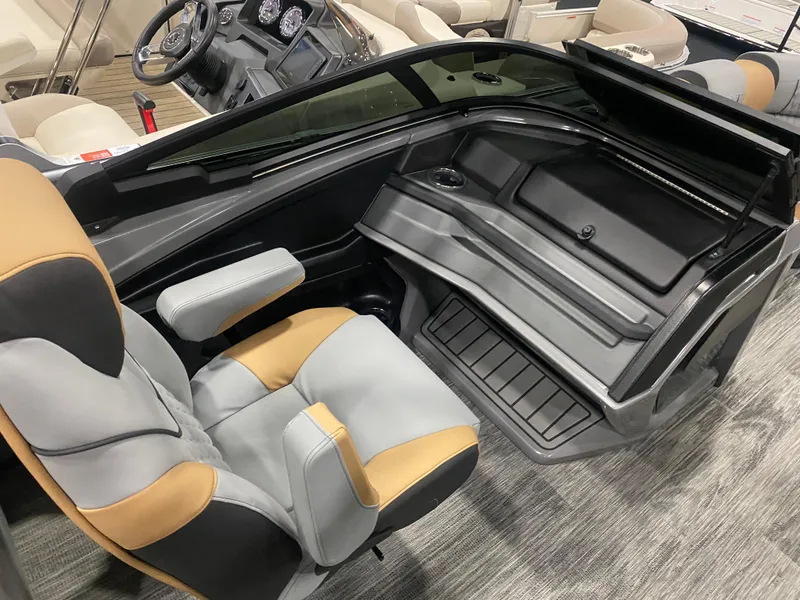 Slide: The Image of 2025 Avalon 2585 Catalina QLW boat interior with modern seating and dashboard. - 6