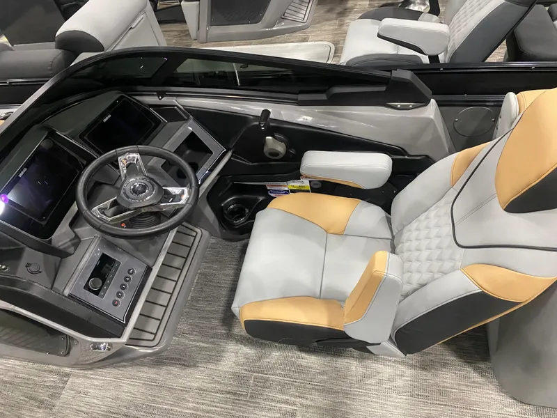 Slide: The Image of 2025 Avalon 2585 Catalina QLW boat interior with modern helm and luxurious seating. - 7