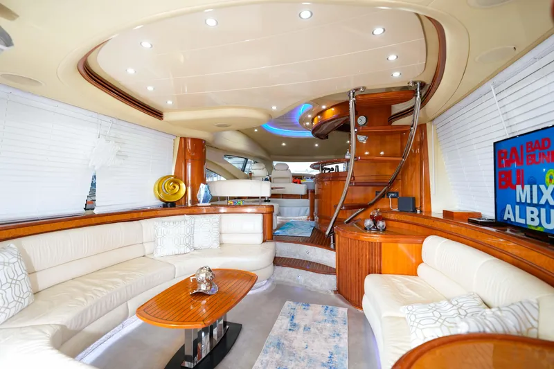 Slide: The Image of Luxurious interior of a 2007 Azimut 68E yacht with elegant seating and modern decor. - 29