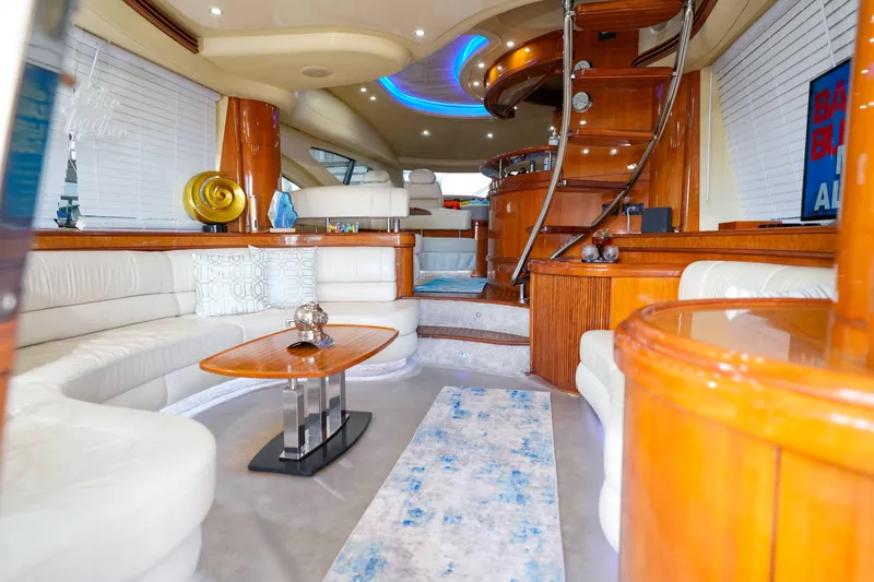 Slide: The Image of Luxurious interior of 2007 Azimut 68E yacht with elegant seating and modern design. - 30
