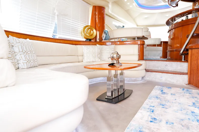 Slide: The Image of Luxurious interior of a 2007 Azimut 68E yacht with elegant seating and decor. - 33