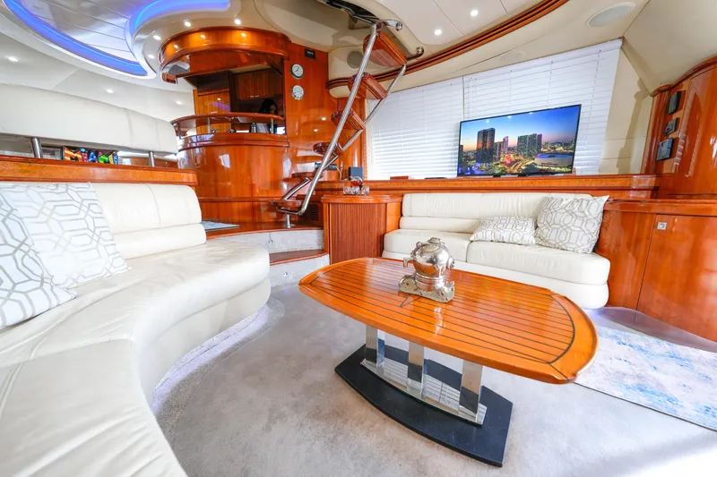 Slide: The Image of Luxurious interior of a 2007 Azimut 68E yacht with elegant seating and modern decor. - 37
