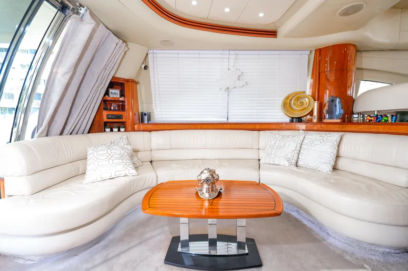 Slide: The Image of Luxurious interior of a 2007 Azimut 68E yacht with elegant seating and decor. - 48