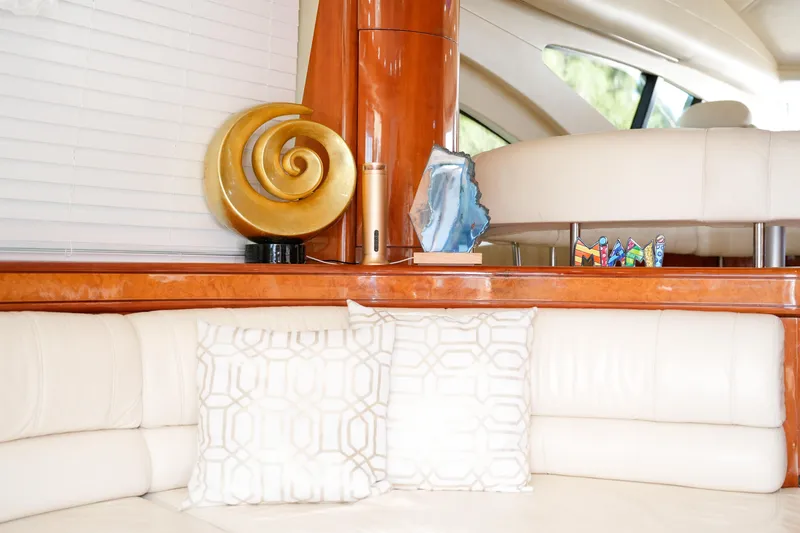 Slide: The Image of Luxurious interior of 2007 Azimut 68E yacht with elegant decor and plush seating. - 49