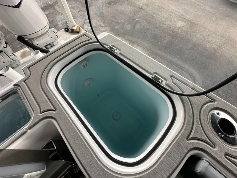 Slide: The Image of Livewell on 2025 Twin Vee 400 GFX2 CC boat, featuring sleek design and functionality. - 15