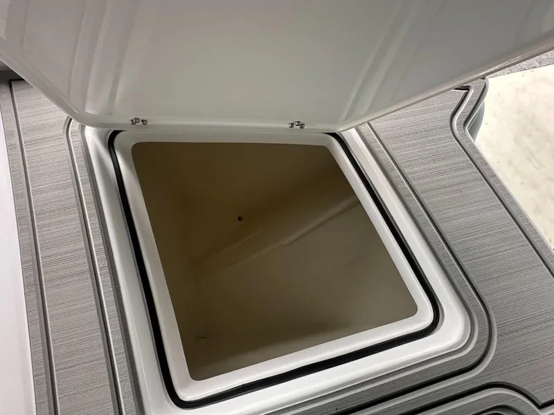 Slide: The Image of Open storage compartment on 2025 Twin Vee 400 GFX2 CC boat. - 35