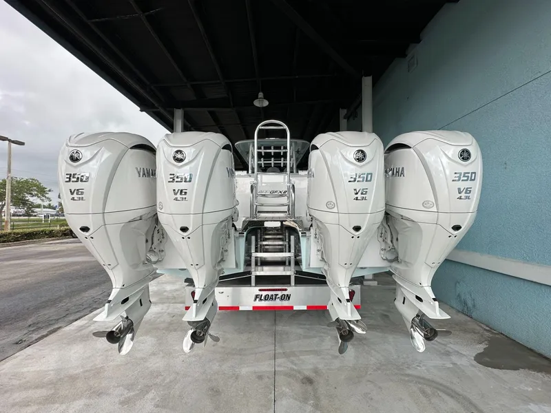 Slide: The Image of 2025 Twin Vee 400 GFX2 CC with four Yamaha 350 V6 outboard engines. - 6