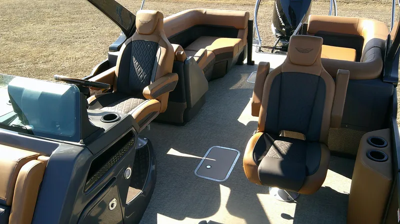 Slide: The Image of 2025 Bennington MFB 26 boat interior with luxurious seating and modern design. - 5