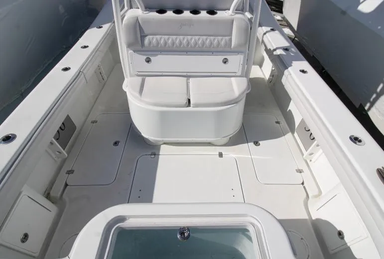 Slide: The Image of 2018 Yellowfin 36 boat interior with spacious deck and seating area. - 15