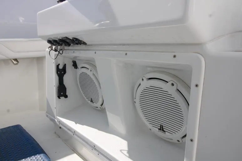 Slide: The Image of 2018 Yellowfin 36 boat speakers and storage compartment detail. - 17