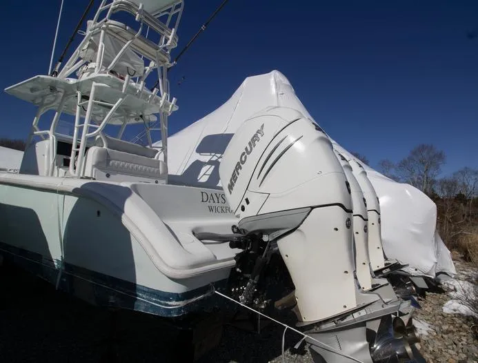 Slide: The Image of 2018 Yellowfin 36 boat with Mercury engines, covered and stored outdoors. - 5