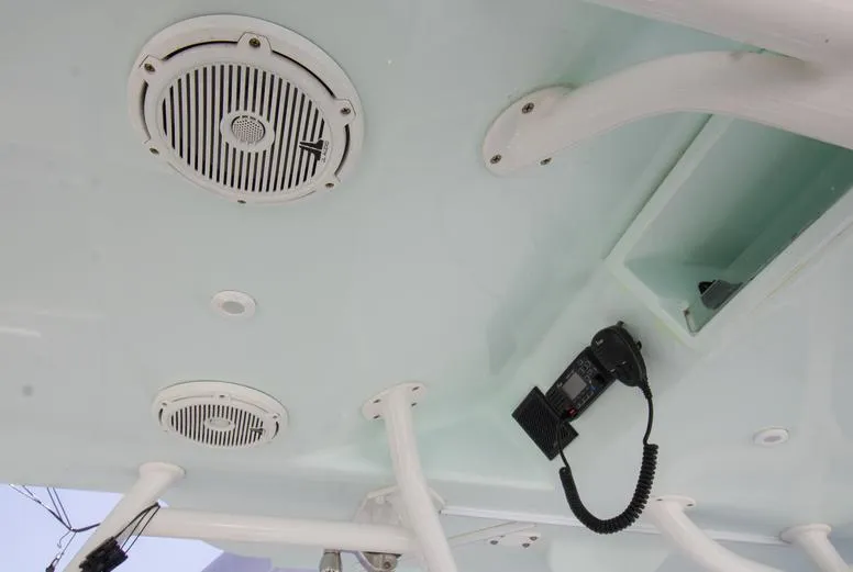 Slide: The Image of 2018 Yellowfin 36 boat ceiling with speakers and radio equipment. - 9