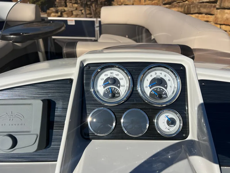 Slide: The Image of Dashboard of 2025 Sylvan Mirage Fish 8522 Party Fish boat with gauges. - 20
