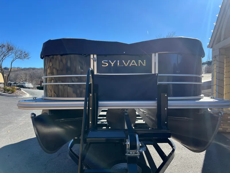 Slide: The Image of 2025 Sylvan Mirage Fish 8522 Party Fish pontoon boat, rear view in sunlight. - 5