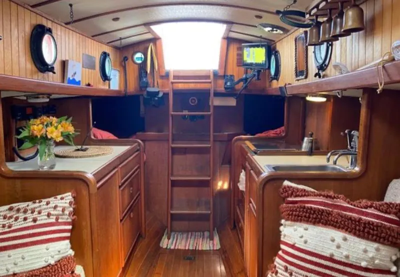 Slide: The Image of Garmin display on 1982 Bristol Channel Cutter 28, wooden interior, nautical setting. - 11