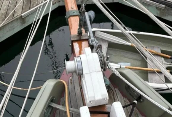 Slide: The Image of Bristol Channel Cutter 28 sailboat deck and rigging, 1982 model, on calm water. - 26